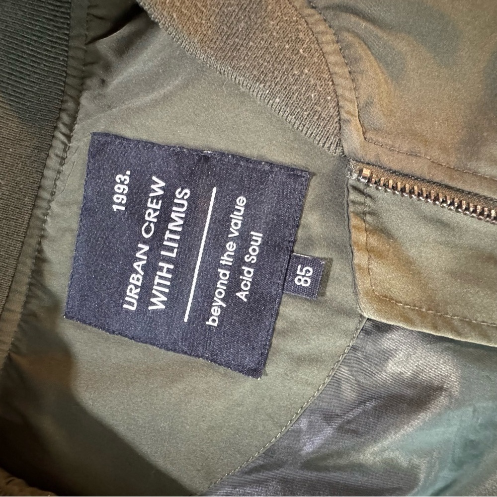 Green Raincoat with Stand-Up Collar and Zipper Closure - Picture 12 of 13
